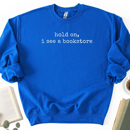 Hold On, I See A Bookstore Unisex Sweatshirt